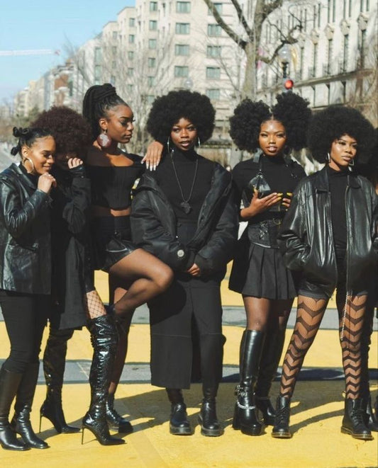 group of women wearing black clothes