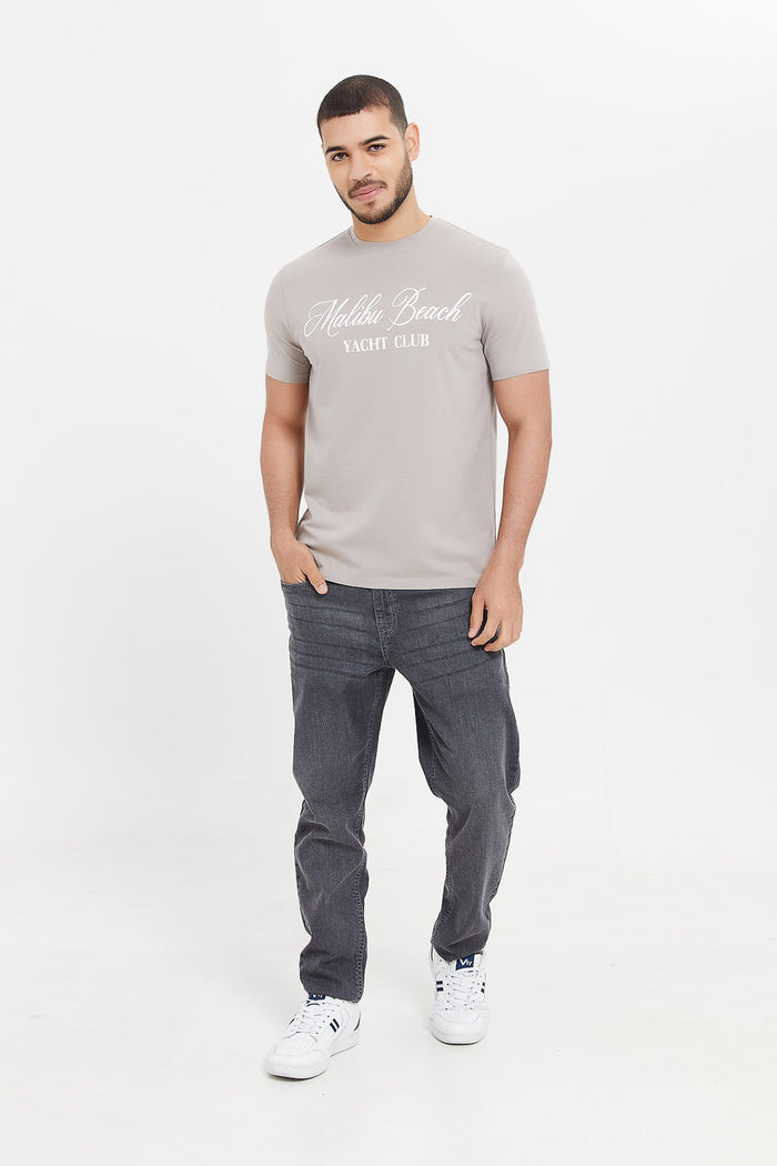 Redtag-Grey-Statement-Tee-With-Stretch-Category:T-Shirts,-Colour:Mid-Grey,-Deals:New-In,-Filter:Men's-Clothing,-H1:MWR,-H2:GEN,-H3:TSH,-H4:TSH,-Men-T-Shirts,-MWRGENTSHTSH,-New-In-Men,-Non-Sale,-ProductType:Printed-T-Shirt,-S23E,-Season:S23E,-Section:Men-Men's-