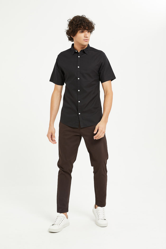 Redtag-Black-Short-Sleeve-Oxford-Shirt-Category:Shirts,-Colour:Black,-Deals:New-In,-Filter:Men's-Clothing,-H1:MWR,-H2:GEN,-H3:SHI,-H4:CSH,-Men-Shirts,-MWRGENSHICSH,-New-In-Men,-Non-Sale,-ProductType:Casual-Shirts,-Season:W23A,-Section:Men,-W23A-Men's-