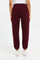 Redtag-Burgundy-Waffle-Jogger-With-Patch-Category:Joggers,-Colour:Burgundy,-Deals:New-In,-Filter:Women's-Clothing,-H1:LWR,-H2:LAD,-H3:SPW,-H4:ATP,-LWRLADSPWATP,-New-In-Women,-Non-Sale,-ProductType:Joggers,-Season:W23B,-Section:Women,-W23B,-Women-Joggers-Women's-