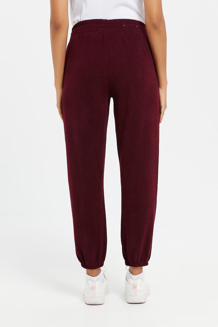 Redtag-Burgundy-Waffle-Jogger-With-Patch-Category:Joggers,-Colour:Burgundy,-Deals:New-In,-Filter:Women's-Clothing,-H1:LWR,-H2:LAD,-H3:SPW,-H4:ATP,-LWRLADSPWATP,-New-In-Women,-Non-Sale,-ProductType:Joggers,-Season:W23B,-Section:Women,-W23B,-Women-Joggers-Women's-