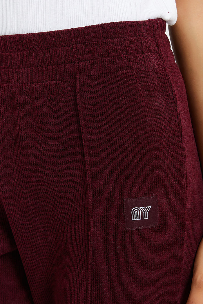 Redtag-Burgundy-Waffle-Jogger-With-Patch-Category:Joggers,-Colour:Burgundy,-Deals:New-In,-Filter:Women's-Clothing,-H1:LWR,-H2:LAD,-H3:SPW,-H4:ATP,-LWRLADSPWATP,-New-In-Women,-Non-Sale,-ProductType:Joggers,-Season:W23B,-Section:Women,-W23B,-Women-Joggers-Women's-