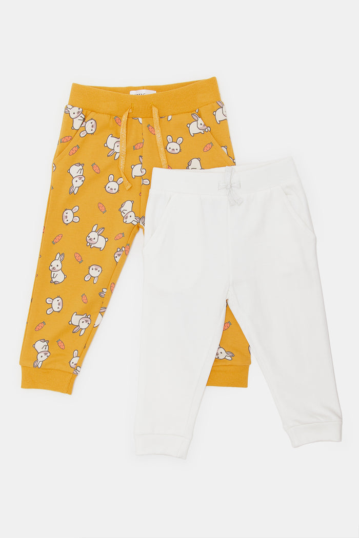 Redtag-Mustard-Aop-&-White-Solid-Active-Track-Pant-Category:Joggers,-Colour:Assorted,-Deals:New-In,-Filter:Infant-Girls-(3-to-24-Mths),-H1:KWR,-H2:ING,-H3:SPW,-H4:ATP,-ING-Joggers,-KWRINGSPWATP,-New-In-ING,-Non-Sale,-ProductType:Joggers,-Season:W23A,-Section:Girls-(0-to-14Yrs),-W23A-Infant-Girls-3 to 24 Months