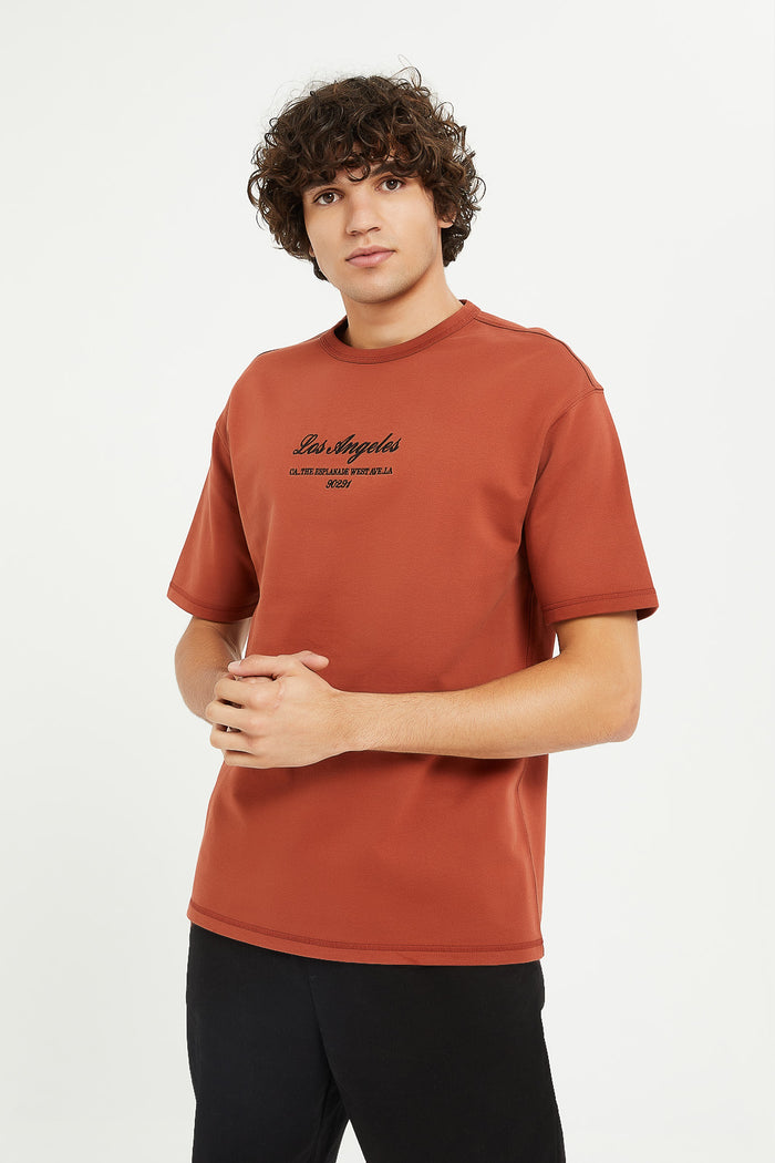 Redtag-Rust-Oversizes-Embroided-Sweat-Tee-Category:T-Shirts,-Colour:Orange,-Deals:New-In,-Filter:Men's-Clothing,-H1:MWR,-H2:GEN,-H3:TSH,-H4:TSH,-Men-T-Shirts,-MWRGENTSHTSH,-New-In-Men,-Non-Sale,-ProductType:Embellished-T-Shirts,-Season:W23A,-Section:Men,-W23A-Men's-