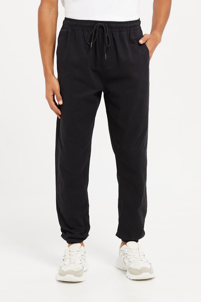 Redtag-Black-Twill-Joggers-Category:Trousers,-Colour:Black,-Deals:New-In,-Filter:Men's-Clothing,-H1:MWR,-H2:GEN,-H3:TRS,-H4:CTR,-Men-Trousers,-MWRGENTRSCTR,-New-In-Men,-Non-Sale,-ProductType:Pants-Jogger-Fit,-Season:W23B,-Section:Men,-TBL,-W23B-Men's-