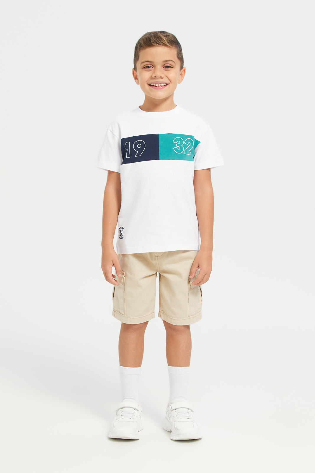 Buy Boys White Printed T-Shirt 129655999 in Saudi Arabia | REDTAG