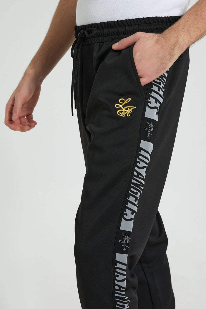 Redtag-Black-Jogger-With-Gold-Signature-Colour:Black,-Filter:Men's-Clothing,-Men-Joggers,-New-In,-New-In-Men,-Non-Sale,-S22B,-Section:Men-Men's-