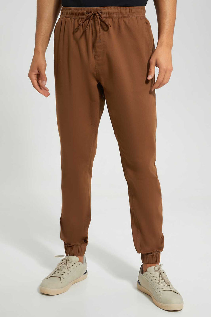 Redtag-Tan-Brown-Slim-Fit-Jogger-Category:Trousers,-Colour:Tan,-Deals:New-In,-Filter:Men's-Clothing,-Men-Trousers,-New-In-Men-APL,-Non-Sale,-S22C,-Section:Men,-TBL-Men's-