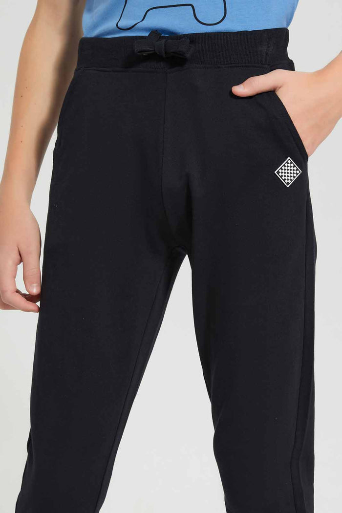 Redtag-Black-Table-Active-Pant-BSR-Joggers,-Category:Joggers,-Colour:Black,-Deals:New-In,-Filter:Senior-Boys-(9-to-14-Yrs),-New-In-BSR-APL,-Non-Sale,-Section:Boys-(0-to-14Yrs),-TBL,-W22O-Senior-Boys-9 to 14 Years