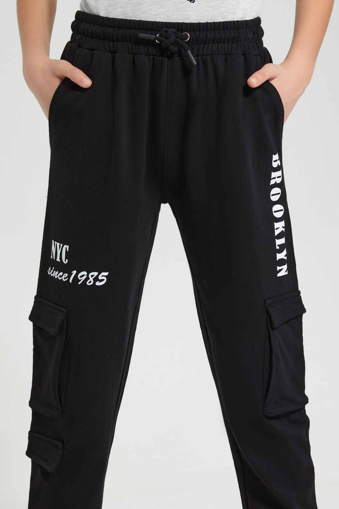 Redtag-Black-Cargo-Pocket-Track-Pant-Category:Joggers,-Colour:Black,-Deals:New-In,-Filter:Senior-Girls-(9-to-14-Yrs),-GSR-Joggers,-New-In-GSR-APL,-Non-Sale,-Section:Girls-(0-to-14Yrs),-W22O-Senior-Girls-9 to 14 Years