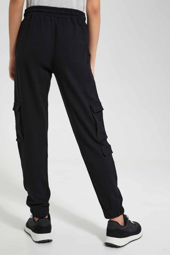 Redtag-Black-Cargo-Pocket-Track-Pant-Category:Joggers,-Colour:Black,-Deals:New-In,-Filter:Senior-Girls-(9-to-14-Yrs),-GSR-Joggers,-New-In-GSR-APL,-Non-Sale,-Section:Girls-(0-to-14Yrs),-W22O-Senior-Girls-9 to 14 Years