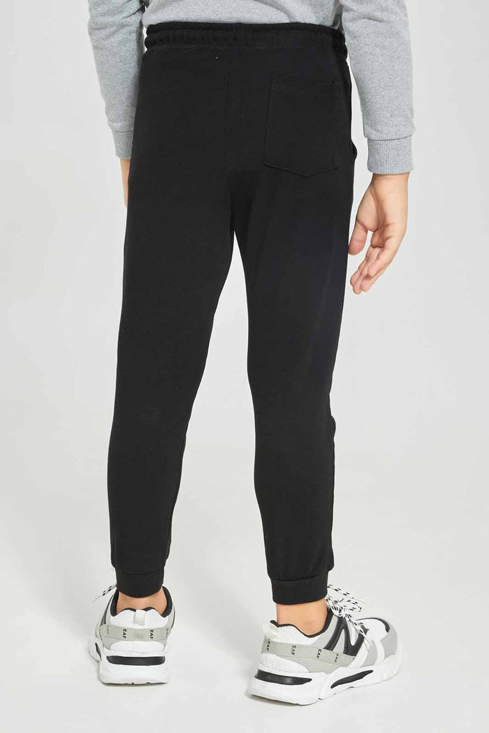 Redtag-Black-Pique-Pant-BOY-Joggers,-Category:Joggers,-Colour:Black,-Deals:New-In,-Dept:Boys,-Filter:Boys-(2-to-8-Yrs),-New-In-BOY-APL,-Non-Sale,-Section:Boys-(0-to-14Yrs),-TBL,-W22A-Boys-2 to 8 Years