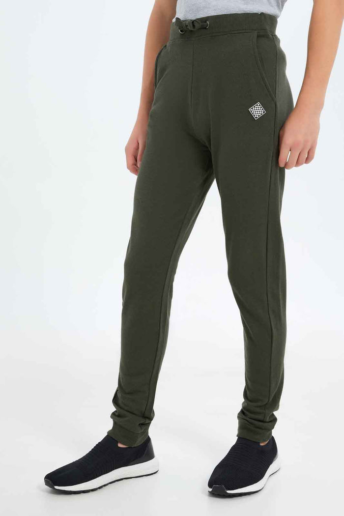 Redtag-Boys-Green-Tabel-Active-Pants-BSR-Joggers,-Category:Joggers,-Colour:Green,-Deals:New-In,-Dept:Boys,-Filter:Senior-Boys-(8-to-14-Yrs),-New-In-BSR-APL,-Non-Sale,-S23B,-Section:Boys-(0-to-14Yrs),-TBL-Senior-Boys-9 to 14 Years