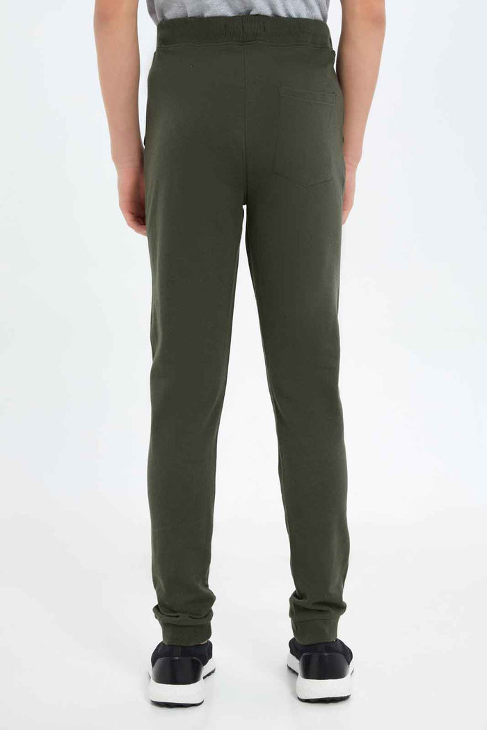 Redtag-Boys-Green-Tabel-Active-Pants-BSR-Joggers,-Category:Joggers,-Colour:Green,-Deals:New-In,-Dept:Boys,-Filter:Senior-Boys-(8-to-14-Yrs),-New-In-BSR-APL,-Non-Sale,-S23B,-Section:Boys-(0-to-14Yrs),-TBL-Senior-Boys-9 to 14 Years