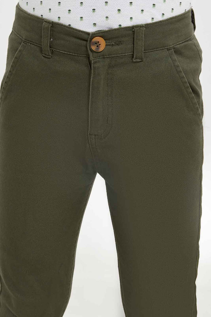 Redtag-Boys-Olive-Chino-Trouser-BOY-Trousers,-Category:Trousers,-Colour:Olive,-Deals:New-In,-Dept:Boys,-Filter:Boys-(2-to-8-Yrs),-New-In-BOY-APL,-Non-Sale,-S23B,-Section:Boys-(0-to-14Yrs),-VLM-Boys-2 to 8 Years