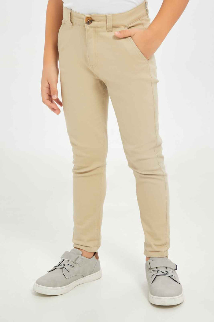 Redtag-Boys-Stone-Chino-Trouser-BOY-Trousers,-Category:Trousers,-Colour:Beige,-Deals:New-In,-Dept:Boys,-Filter:Boys-(2-to-8-Yrs),-New-In-BOY-APL,-Non-Sale,-S23B,-Section:Boys-(0-to-14Yrs),-VLM-Boys-2 to 8 Years