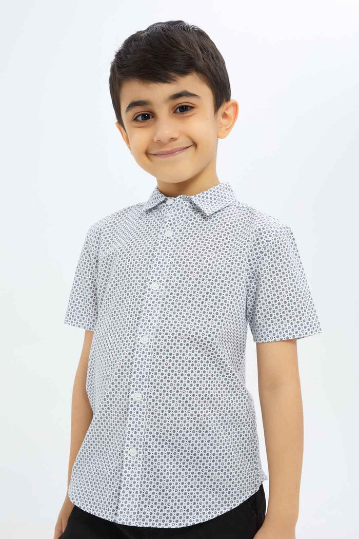 Redtag-Boys-White-Print-Short-Sleeve-Shirt-BOY-Shirts,-Category:Shirts,-Colour:White,-Deals:New-In,-Dept:Boys,-Filter:Boys-(2-to-8-Yrs),-New-In-BOY-APL,-Non-Sale,-S23C,-Section:Boys-(0-to-14Yrs)-Boys-2 to 8 Years