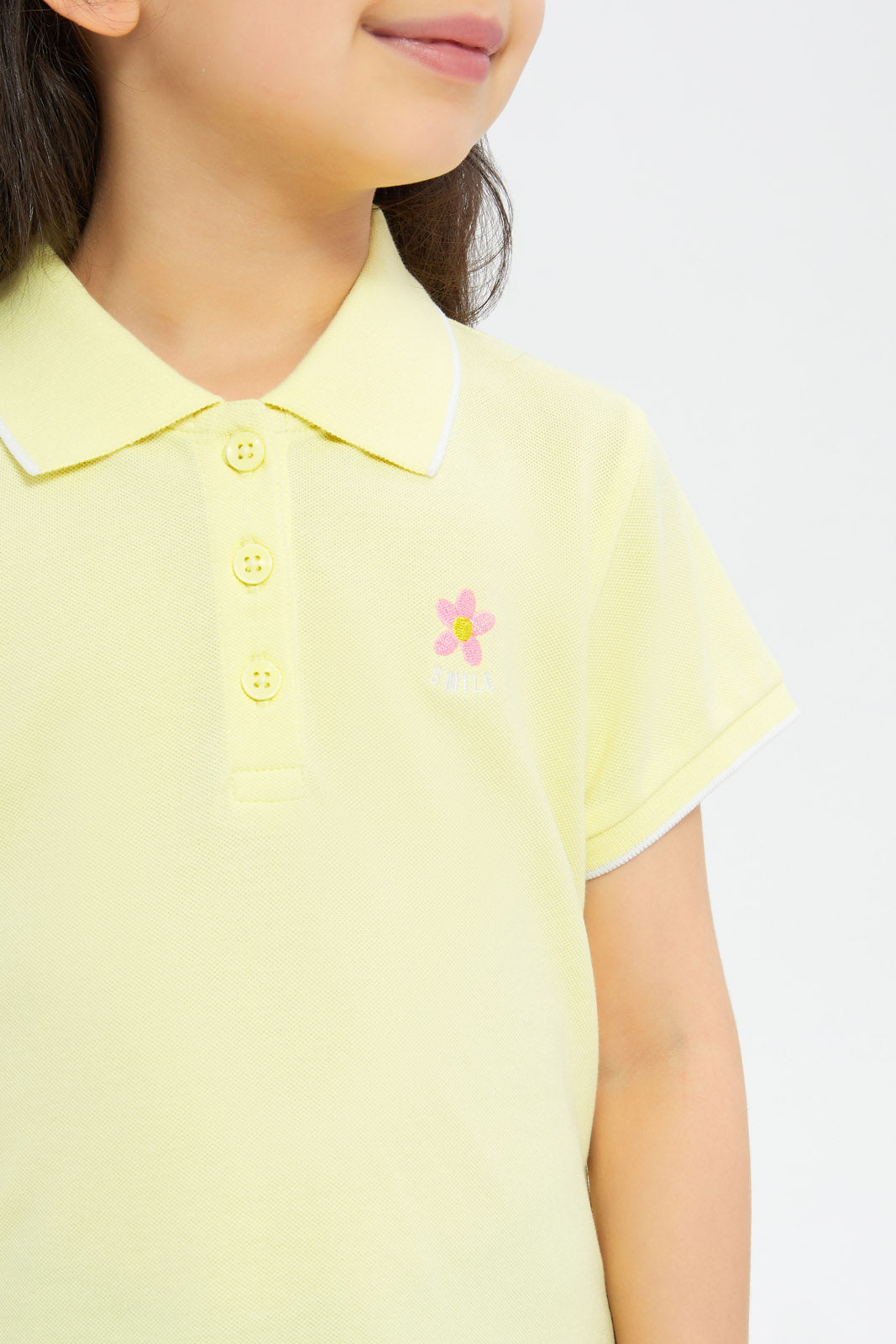 Buy Girls Yellow Solid With Embroidered Polo Shirt 125297776 in