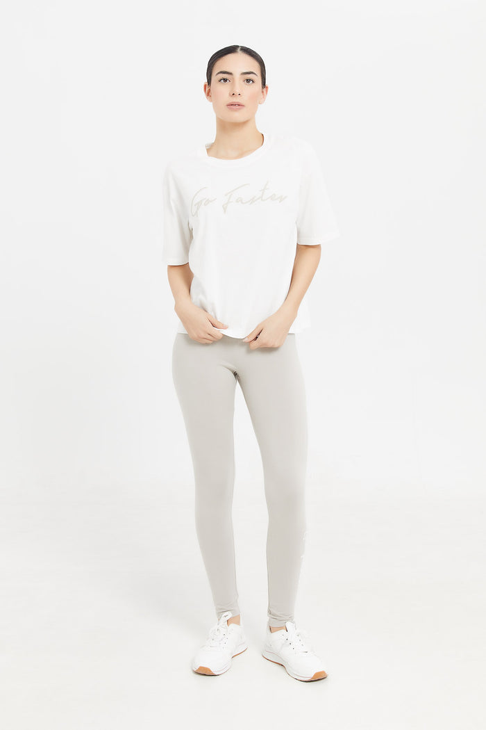 Redtag-Women-White-Boxy-Fit-Placement-Print-T-Shirt-Category:T-Shirts,-Colour:White,-Deals:New-In,-Filter:Women's-Clothing,-H1:LWR,-H2:LAD,-H3:SPW,-H4:ATS,-LWRLADSPWATS,-New-In-Women-APL,-Non-Sale,-ProductType:Graphic-T-Shirts,-S23D,-Season:S23D,-Section:Women,-Women-T-Shirts-Women's-