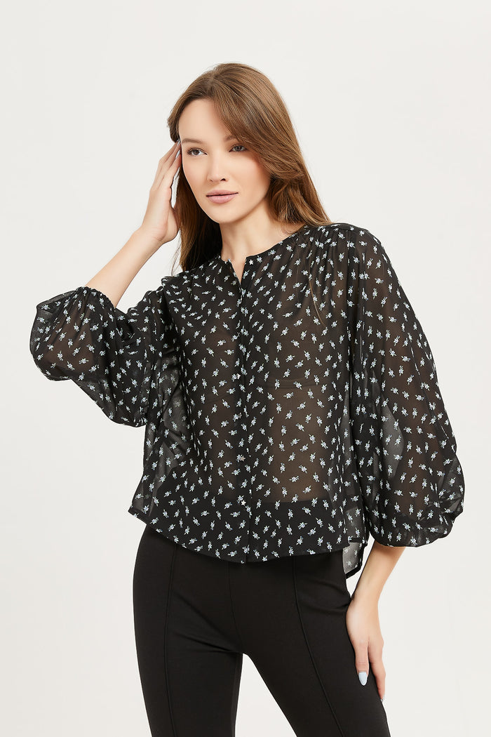 woman wearing a chiffon blouse